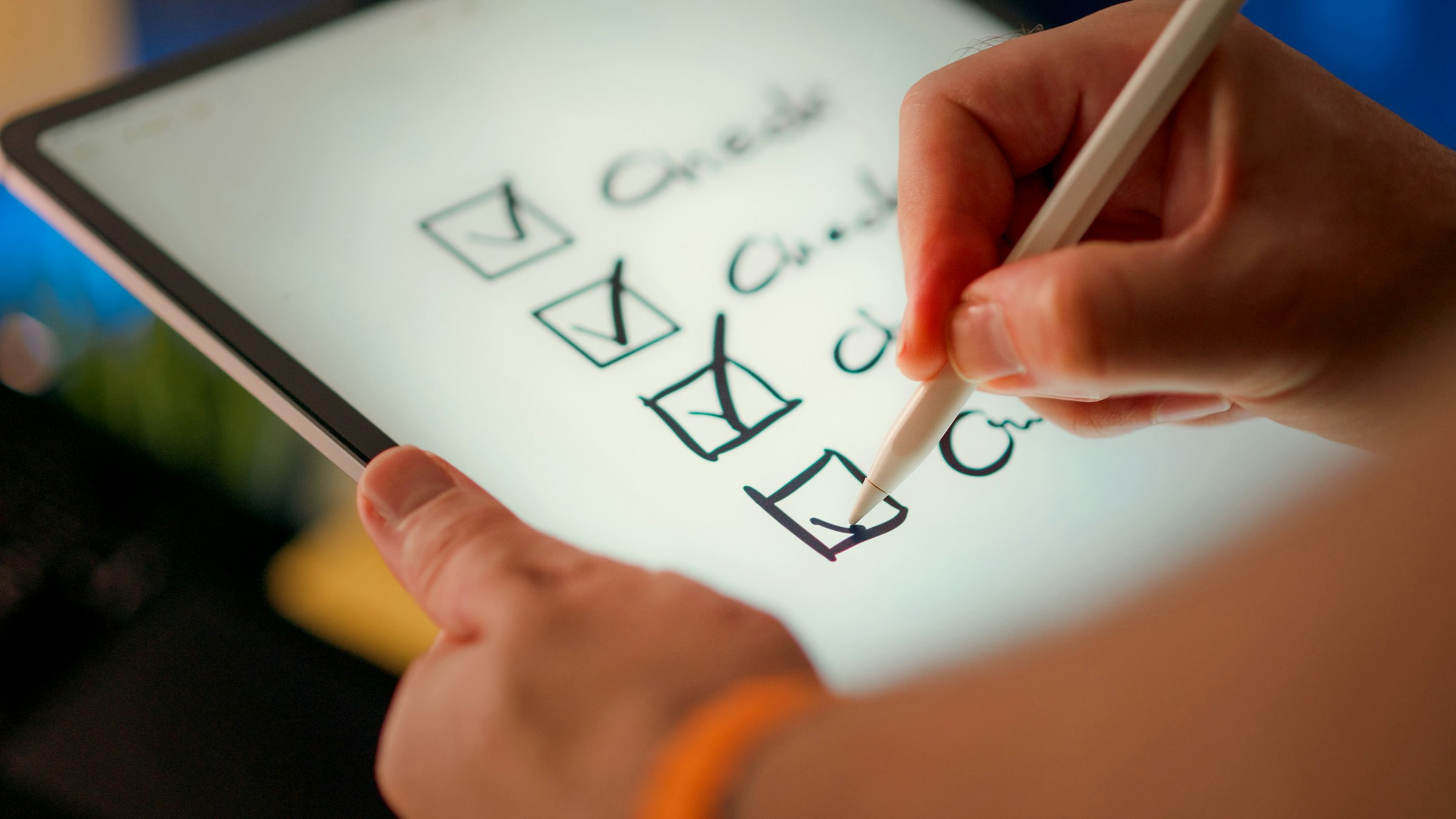 A hand marks off items on a checklist, representing an Edge Retail after-sales site visit